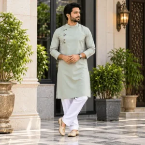 Man wearing a modern light green kurta pajama design